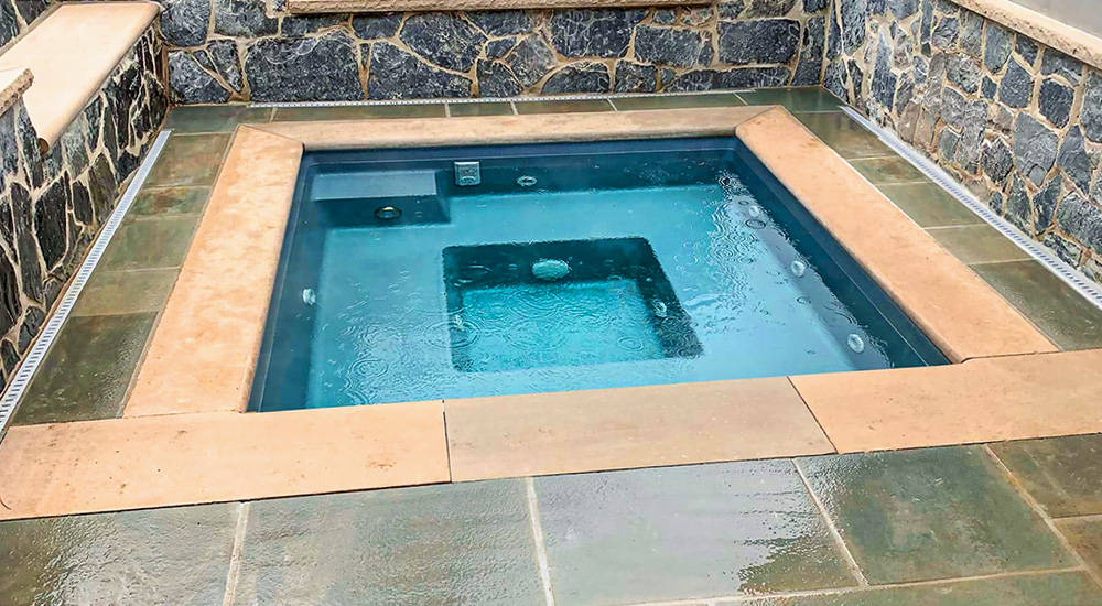 Spa with hardscaping