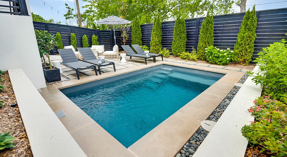 The vision pool by imagine pools in nice backyard