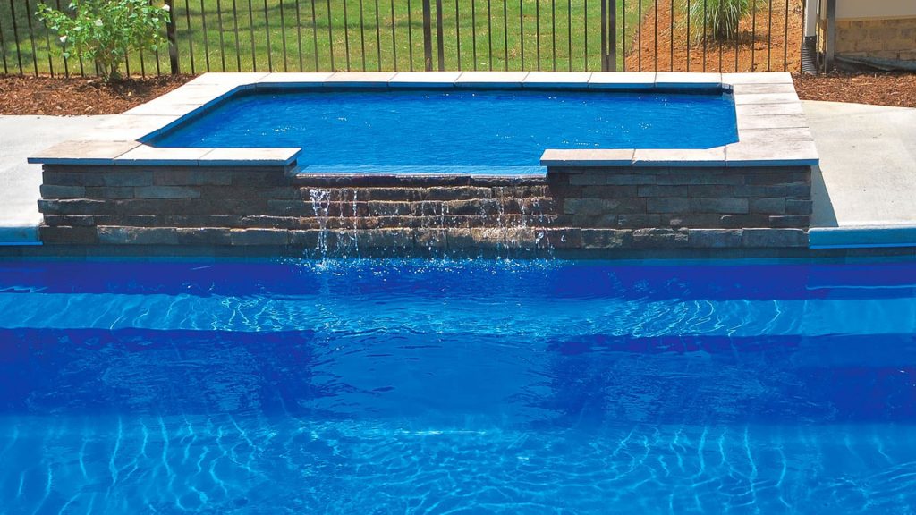 The Mercury fiberglass Tanning Ledge by Imagine Pools.